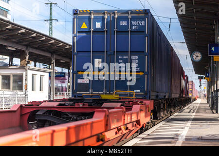 FUERTH / GERMANY - MARCH 11, 2018: a european freight train passes train station Fuerth in Germany Stock Photo