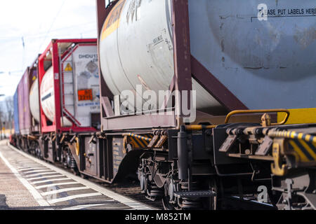 FUERTH / GERMANY - MARCH 11, 2018: a european freight train passes train station Fuerth in Germany Stock Photo