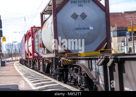 FUERTH / GERMANY - MARCH 11, 2018: a european freight train passes train station Fuerth in Germany Stock Photo