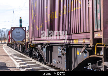 FUERTH / GERMANY - MARCH 11, 2018: a european freight train passes train station Fuerth in Germany Stock Photo