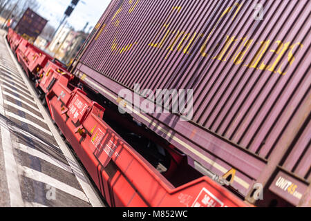 FUERTH / GERMANY - MARCH 11, 2018: a european freight train passes train station Fuerth in Germany Stock Photo