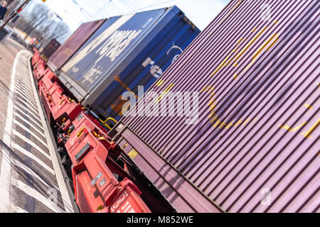 FUERTH / GERMANY - MARCH 11, 2018: a european freight train passes train station Fuerth in Germany Stock Photo