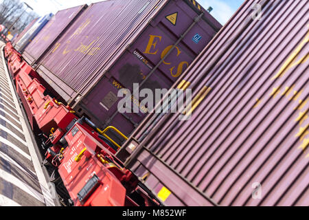 FUERTH / GERMANY - MARCH 11, 2018: a european freight train passes train station Fuerth in Germany Stock Photo