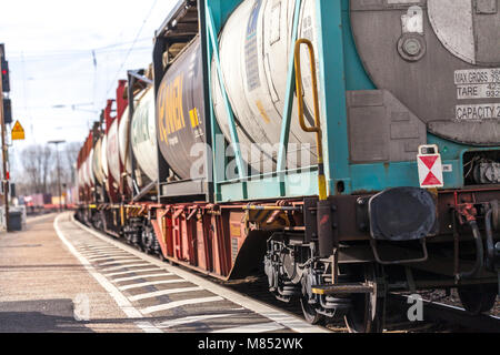 FUERTH / GERMANY - MARCH 11, 2018: a european freight train passes train station Fuerth in Germany Stock Photo