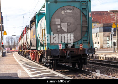 FUERTH / GERMANY - MARCH 11, 2018: a european freight train passes train station Fuerth in Germany Stock Photo