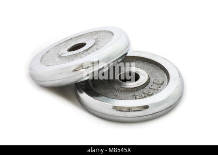 Stack of iron plates for weight training isolated on white background. Stock Photo