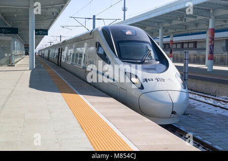 View of a CRH high-speed bullet train at the YANJIXI Railway Station, JILIN, CHINA Stock Photo