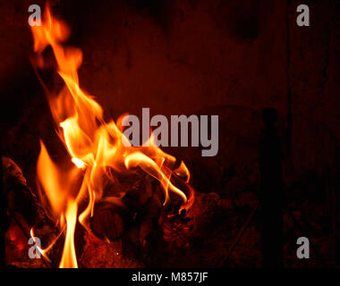 close-up view of warm fire burning in a fireplace Stock Photo