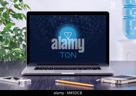 Telegram Open Network TON white paper cover with TON logo on macbook screen. Telegram TON by Durov is the future of blockchain and cryptocurrency. Stock Photo