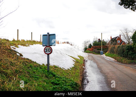 Thawing snowdrifts after heavy snowfall on the Norfolk Broads at Ranworth, Norfolk, England, United Kingdom, Europe. Stock Photo