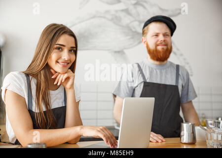 Coffee Business Concept - Portrait of small business partners working together at their coffee shop  Stock Photo