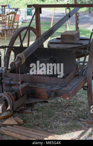 Old mobile blacksmiths forge on display at a American Civil War reenactment in Huntington Beach California Stock Photo