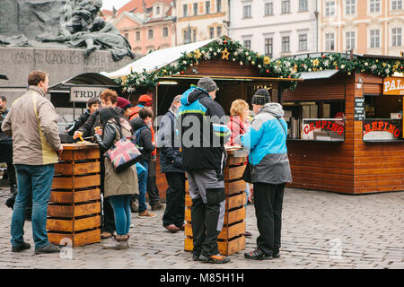 Prague, December 13, 2016: Old Town Square in Prague on Christmas Day. Christmas market in the main square of the city. Local residents and tourists e Stock Photo