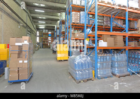 Shelves With Food and Drinks in Distribution Warehouse Stock Photo