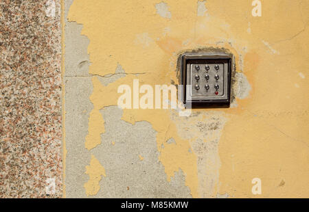 Keypad . numeric keyboard on the wall . Stock Photo