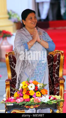 Kathmandu, Nepal. 14th Mar, 2018. Nepal's President Bidhya Devi Bhandari greets after the oath taking ceremony at the presidential office in Kathmandu, Nepal, March 14, 2018. Bidhya Devi Bhandari was re-elected as the president of Nepal for a second term through a parliament vote on Tuesday. Credit: Sunil Sharma/Xinhua/Alamy Live News Stock Photo