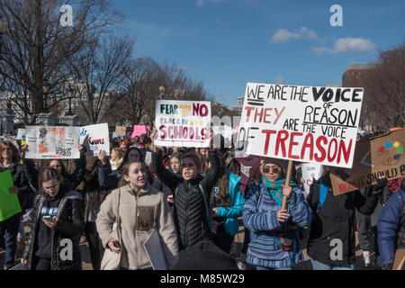 Washington, DC, USA. 14th March, 2018. Students from area high schools march from the  White House during the National School Walkout, protesting government’s inaction on gun control, while showing solidarity for the 17 students murdered at Marjory Stoneman Douglas High School in Parkland, Florida. A rally at the U.S. Capitol followed. Bob Korn/Alamy Live News Stock Photo