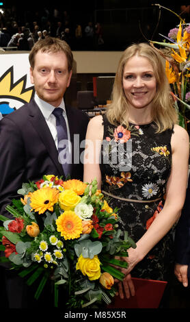 14 March 2018, Germany, Leipzig: The Norwegian author and journalist Åsne Seierstad receives the Leipzig Book Prize for European Understanding from Saxony's Premier Michael Kretschmer (CDU). The Leipzig Book Fair was officially opened with the ceremony at the Gewandhaus concert hall. Some 2600 exhibitors present the novelties of the publishing industry from 15 March two 18 March 2018. Photo: Sebastian Willnow/dpa-Zentralbild/dpa Stock Photo