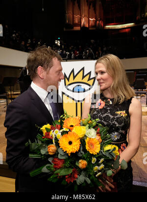 14 March 2018, Germany, Leipzig: The Norwegian author and journalist Åsne Seierstad receives the Leipzig Book Prize for European Understanding from Saxony's Premier Michael Kretschmer (CDU). The Leipzig Book Fair was officially opened with the ceremony at the Gewandhaus concert hall. Some 2600 exhibitors present the novelties of the publishing industry from 15 March two 18 March 2018. Photo: Sebastian Willnow/dpa-Zentralbild/dpa Stock Photo