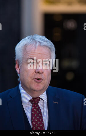 London, UK. 14th March, 2018. Carwyn Jones, First Minister of Wales, speaks to broadcast media outside 10 Downing Street following a meeting with Prime Minister Theresa May. Subjects discussed included Clause 11 in the EU Withdrawal Bill, the Swansea Bay tidal lagoon, the devolution of Air Passenger Duty and the United States’ recent statements regarding steel. Credit: Mark Kerrison/Alamy Live News Stock Photo