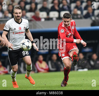 (180315) -- ISTANBUL, March 15, 2018(Xinhua) -- James Rodriguez (R) of Bayern Munich shoots during the 2017-2018 UEFA Champions League round of 16 second leg soccer match between Turkey's Besiktas and Germany's Bayern Munich in Istanbul, Turkey, on March 14, 2018. Bayern Munich won 3-1 and was qualified for quarterfinals. (Xinhua/He Canling) Stock Photo