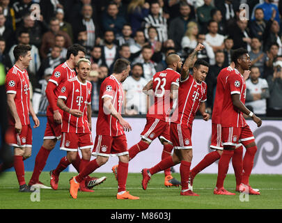 (180315) -- ISTANBUL, March 15, 2018(Xinhua) -- Players of Bayern Munich celebrate scoring during the 2017-2018 UEFA Champions League round of 16 second leg soccer match between Turkey's Besiktas and Germany's Bayern Munich in Istanbul, Turkey, on March 14, 2018. Bayern Munich won 3-1 and was qualified for quarterfinals. (Xinhua/He Canling) Stock Photo