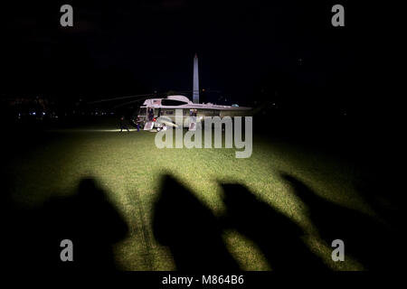 Washington, District of Columbia, USA. 14th Mar, 2018. United States President Donald J. Trump exits Marine One as he arrives at the White House in Washington, DC, after travel to Southern California and St. Louis on Wednesday, March 14, 2018. Credit: Eric Thayer/Pool via CNP Credit: Eric Thayer/CNP/ZUMA Wire/Alamy Live News Stock Photo