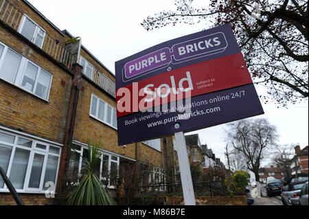 A Purple Bricks sold estate agent sign outside a house in Muswell Hill, London