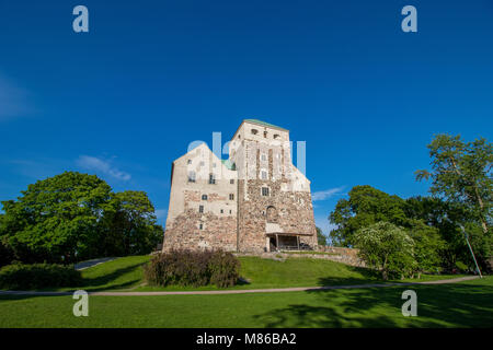 Turku Castle in the city of Turku in Finland.   Turku Castle is a medieval building founded in the late 13th century. Stock Photo