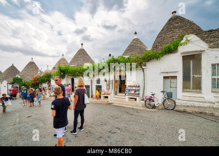 ALBEROBELLO (BA), ITALY - SEPTEMBER 1, 2016: Alberobello, with more than one hundred thousands of arrivals in 2015, drives tourism in Puglia as ninth  Stock Photo