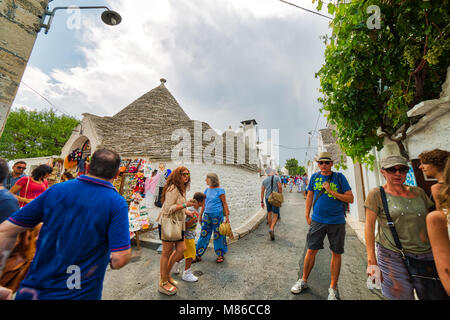 ALBEROBELLO (BA), ITALY - SEPTEMBER 1, 2016: Alberobello, with more than one hundred thousands of arrivals in 2015, drives tourism in Puglia as ninth  Stock Photo