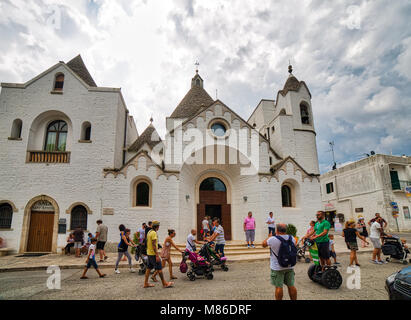 ALBEROBELLO (BA), ITALY - SEPTEMBER 1, 2016: Alberobello, with more than one hundred thousands of arrivals in 2015, drives tourism in Puglia as ninth  Stock Photo