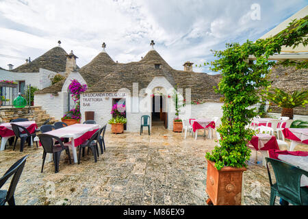 ALBEROBELLO (BA), ITALY - SEPTEMBER 1, 2016: Alberobello, with more than one hundred thousands of arrivals in 2015, drives tourism in Puglia as ninth  Stock Photo