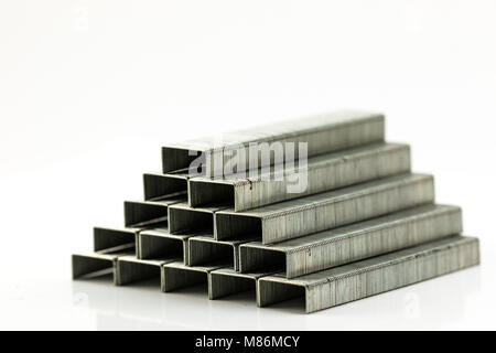 Stack of Staples on white background Stock Photo
