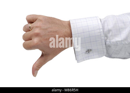 Businessman giving a thumb down negative or disapprove sign isolated against a white background. Stock Photo