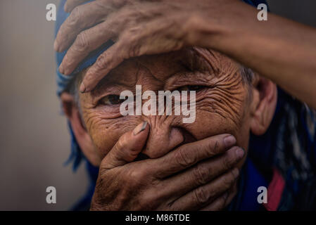 MU CANG CHAI, VIETNAM, September 20, 2017: Undefined Vietnamese Hmong at rice terrace in Mu Chang Chai, Vietnam. Stock Photo