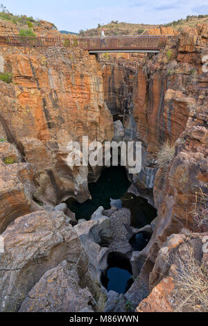 Man walking across a bridge, Bourke's Luck Potholes, Mpumalanga, South Africa Stock Photo