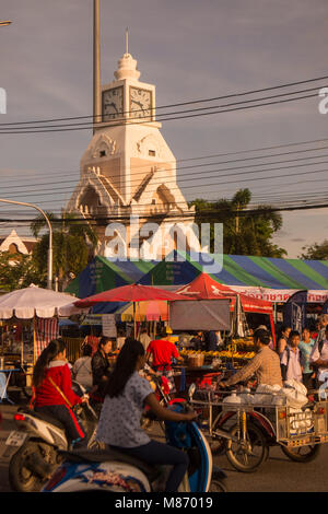 the colck tower with the streetmarket at the Phimai festival in the Town of Phimai in the Provinz Nakhon Ratchasima in Isan in Thailand.  Thailand, Ph Stock Photo
