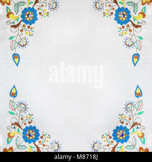 Folk frame made of handmade embroidery elements. Stock Photo