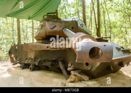 American M41 tank which was destroyed by a Viet Cong delay action mine in 1970.  It has remained in situ ever since.  Cu Chi Tunnels, Vietnam. Stock Photo