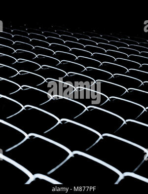 Black background with fence mesh. Abstract background Stock Photo