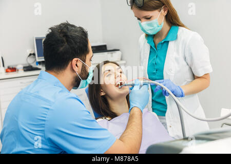 Getting Ready To Start Dental Examination Stock Photo
