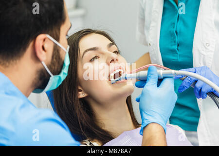 Getting Ready To Start Dental Examination Stock Photo