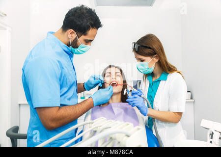 Getting Ready To Start Dental Examination Stock Photo