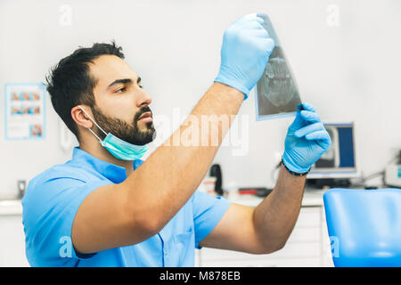 Dentist Studies the X-ray Stock Photo