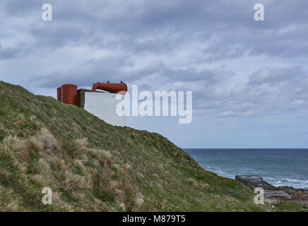 The Girdle Ness Foghorn in Aberdeenshire pointing east towards the North sea on a bright Spring day. Stock Photo