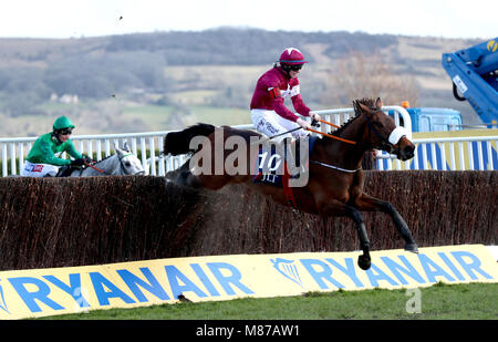 Shattered Love ridden by jockey Jack Kennedy goes on to win the JLT Novices' Chase during St Patrick's Thursday of the 2018 Cheltenham Festival at Cheltenham Racecourse. Stock Photo