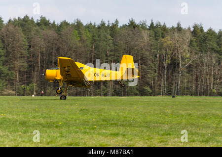 PLASY, CZECH REPUBLIC - APRIL 30: Zlin Z-37 Cmelak Czech agricultural airplane used as crop duster flying on April 30, 2017 in Plasy, Czech Republic. Stock Photo