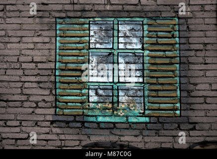 Large black metal-plastic window on the wall. Kitchen window sill with flowers in pots. From the window the sun shines brightly. Spring or summer morn Stock Photo
