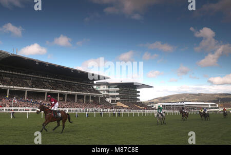 Shattered Love ridden by jockey Jack Kennedy win the JLT Novices' Chase during St Patrick's Thursday of the 2018 Cheltenham Festival at Cheltenham Racecourse. Stock Photo